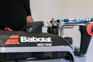 A Babolat stringing machine